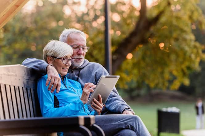 older couple on park bench